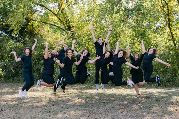 Group photo of the staff jumping at Parkside Dental